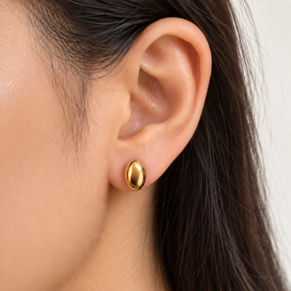 Céline Oval Studs on a white background